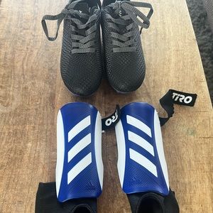 Toddler size 9 soccer cleats and shin guards . Excellent condition.